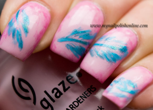 Pink and blue feather nail art