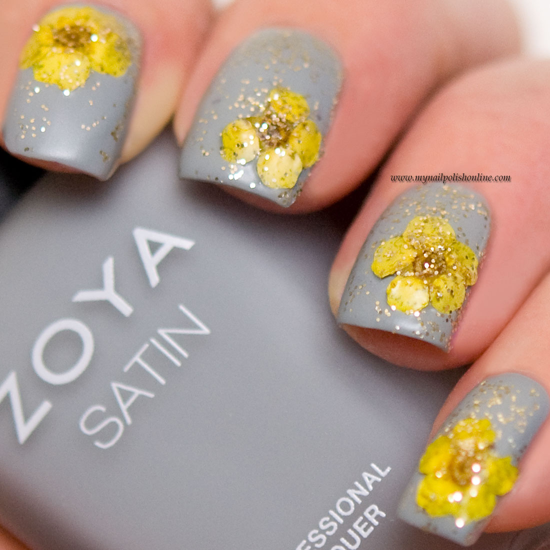 Matte nail art with dried flowers