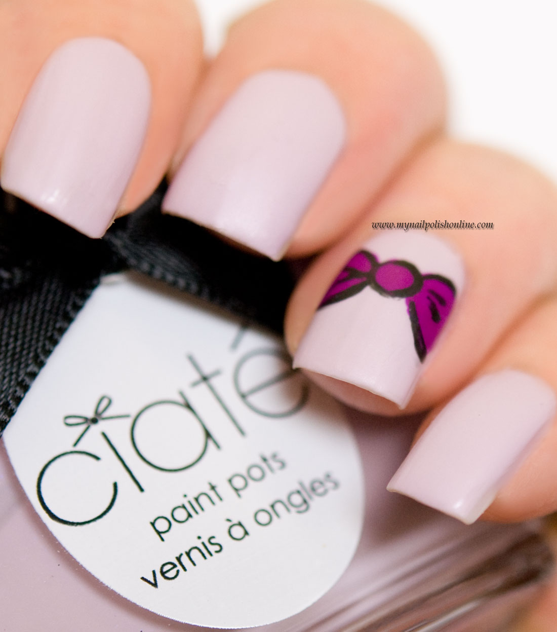 Nail Art - violet bow on pink